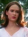 Merlyn Temple, Caleb's murdered sister, now a ghost, played by Sarah Paulson